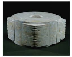 <p>Material: carved jade</p><p>Original Location: Liangzhu, China</p><p>Culture/period: Liangzhu people</p><p>Date: 3300 BCE</p><hr><p>Current Location: Zhejiang Institute of Archaeology. British Museum.</p><p>City: <span>Hangzhou. London.</span></p><p>State: <span>Liangzhu</span></p><p>Country: <span>China. England</span></p>