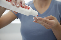 <p>a strong type of sunscreen (= a substance that you put on your skin to prevent it from being damaged by the sun), that prevents any of the sun's rays from reaching the skin<br>Ex: <em>She usually use </em><strong><em><u>sunblock </u></em></strong><em>when she go to beach</em></p>