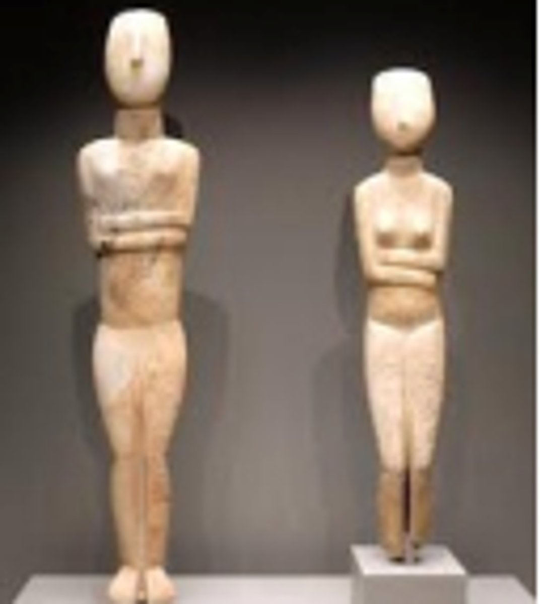 <p>Marble figurines from the Early Bronze Age (ca. 2500 BCE); abstract female figures used for funerary purposes; early marble carving; minimalist Cycladic style.</p>