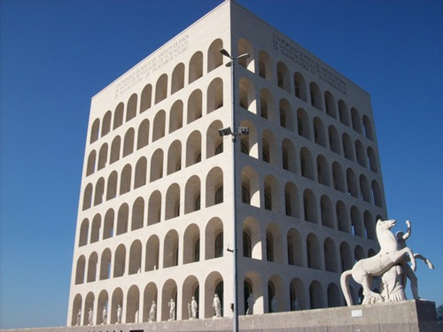 <p>EUR, Fascist, 1937-40, Giovanni Guerrini, Ernesto La Padula, Mario Romano</p><p>Palace of Italian Civilization and a museum of culture. A modern take on traditional Roman designs. Abandoned, but now used by Fendi.</p>