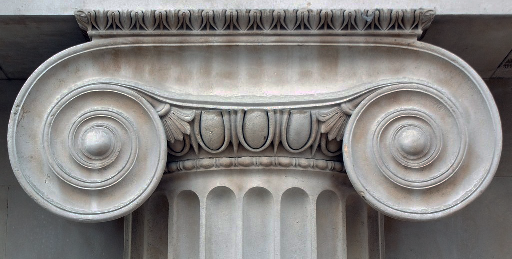 <p>Ionic only; spiral element on capitals, decor on facades or interiors</p>