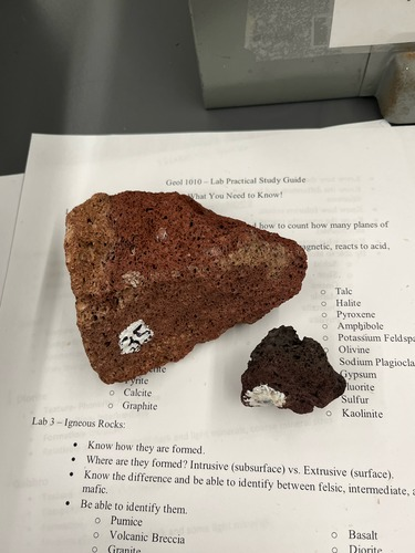 <ul><li><p>Vesicular</p></li><li><p>Mafic, dark brown or red</p></li><li><p>Extrusive</p></li><li><p>Fine grained</p></li><li><p>lightweight </p></li></ul>