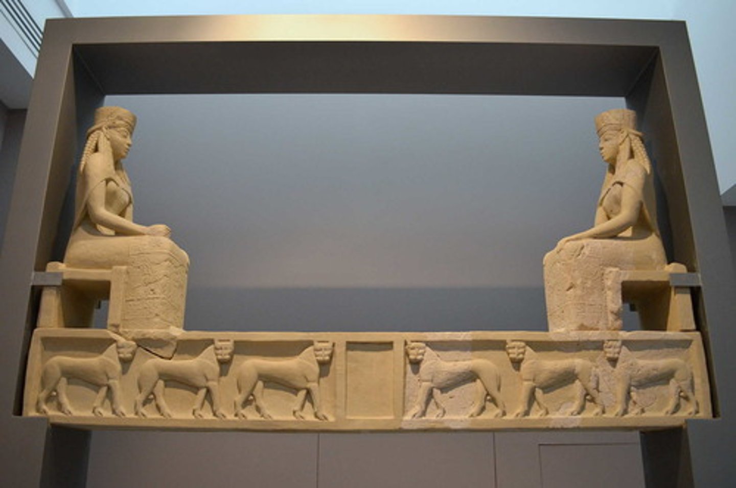 <p>Who: The temple and sculpture were created by ancient Greek artisans12.</p><p>What: The temple, known as Temple A, is the earliest known Greek temple decorated with sculpture12. The most remarkable surviving detail is a limestone lintel bearing two monumental statues of goddesses, seated facing each other12.</p><p>Where: The temple and sculpture were discovered in Prinias, an ancient city located in Crete12. They are currently housed in the Heraklion Archaeological Museum1.</p><p>When: The temple and sculpture date back to around 650-625 BC12.</p><p>Why it's interesting and important: The temple and sculpture from Prinias are significant for several reasons:</p><p>They provide valuable insights into the art and architecture of this era in Crete1.</p><p>The sculptures from the temple are the earliest known example of the seated deity type1.</p><p>The divine nature of the figures is indicated by their expression of calm detachment1.</p><p>Under the goddesses, the epistyle of the doorway is decorated with six panthers in relief1.</p><p>Despite their partial state of preservation, which allows different proposed reconstructions, the sculptures of the temple of Prinias are a unique source of information on the art and architecture of this era in Crete1.</p>