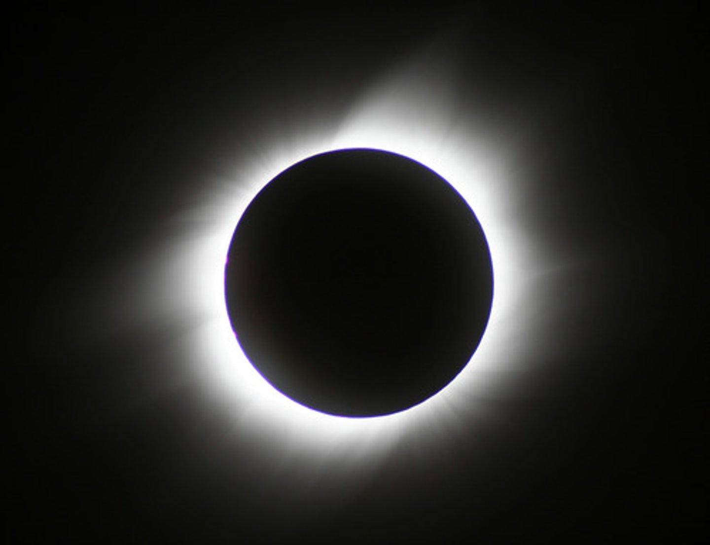 <p>a complete blocking of the sun by the moon. Occurs when you are standing in the moon's umbra.</p>