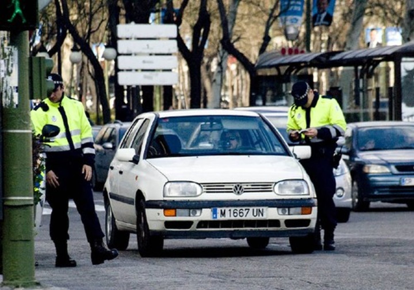 <p>to give a ticket</p>