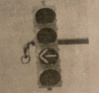 <p>A flashing yellow arrow like the one in the picture means you are required to do what? </p>