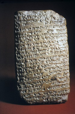 <p>Imprinting symbols on wet clay</p>