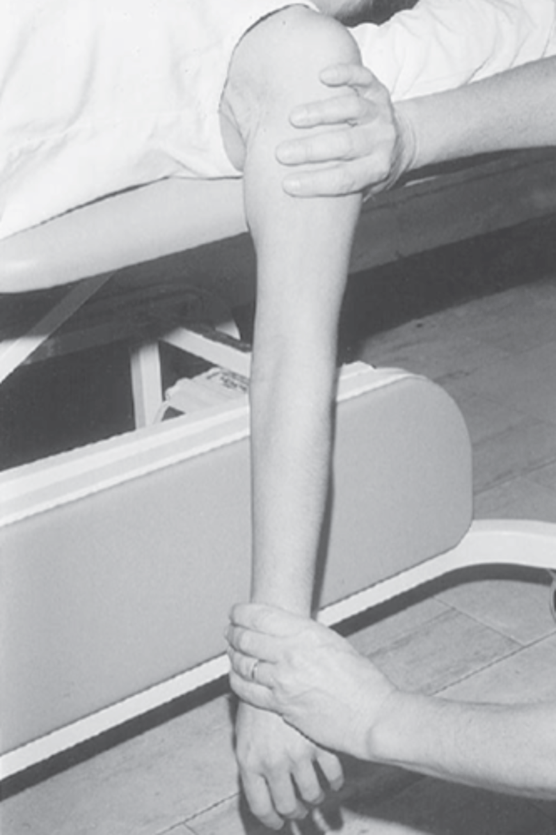 <p>Starting position: supine, shoulder extended, forearm pronated</p><p>Testing motion: Extend the elbow until resistance is felt, and additional elbow extension causes shoulder flexion</p><p>Pos/neg: no normative value</p>