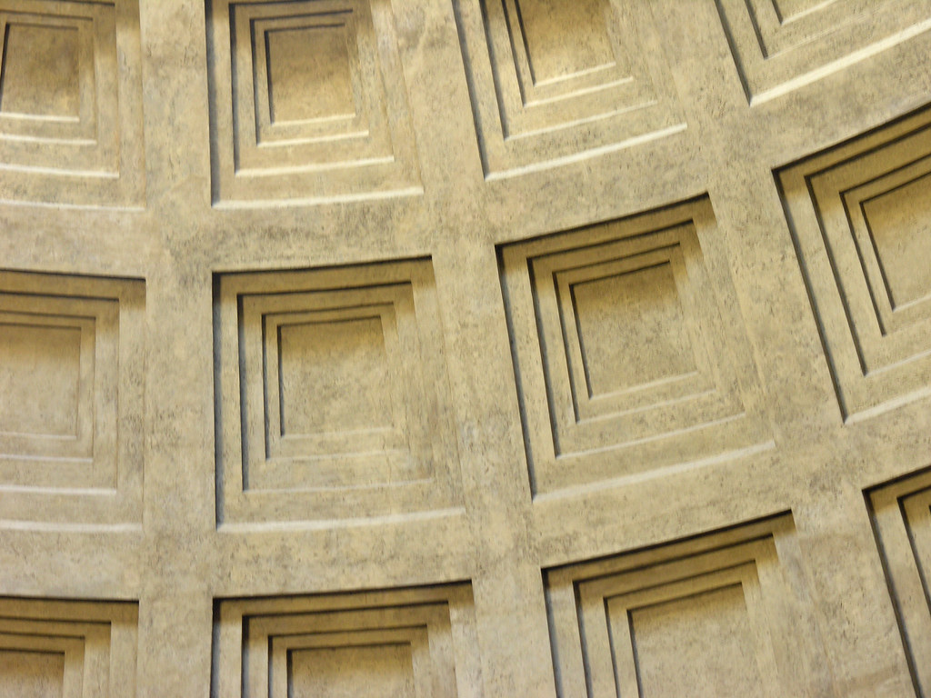 <p>Square indents in dome, formally painted. Highlighted by Oculus. Lightened domes weight, Originally painted dark with golden, stylized rosed like stars in heaven. </p>