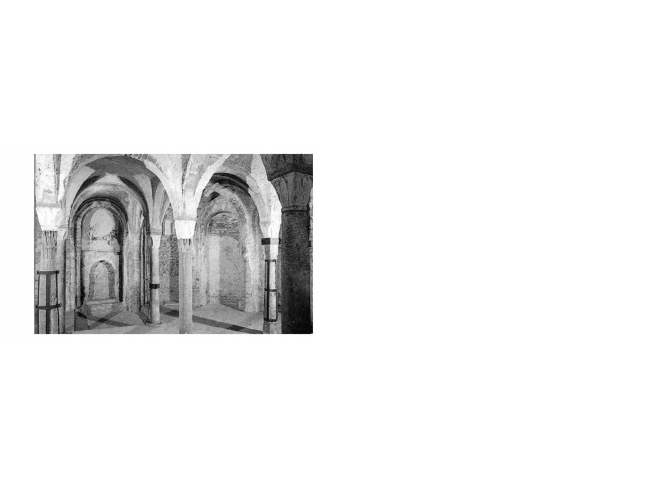 <p>In a church, a chamber or vault beneath the main door, not necessarily underground, and usually containing graves or relics</p>