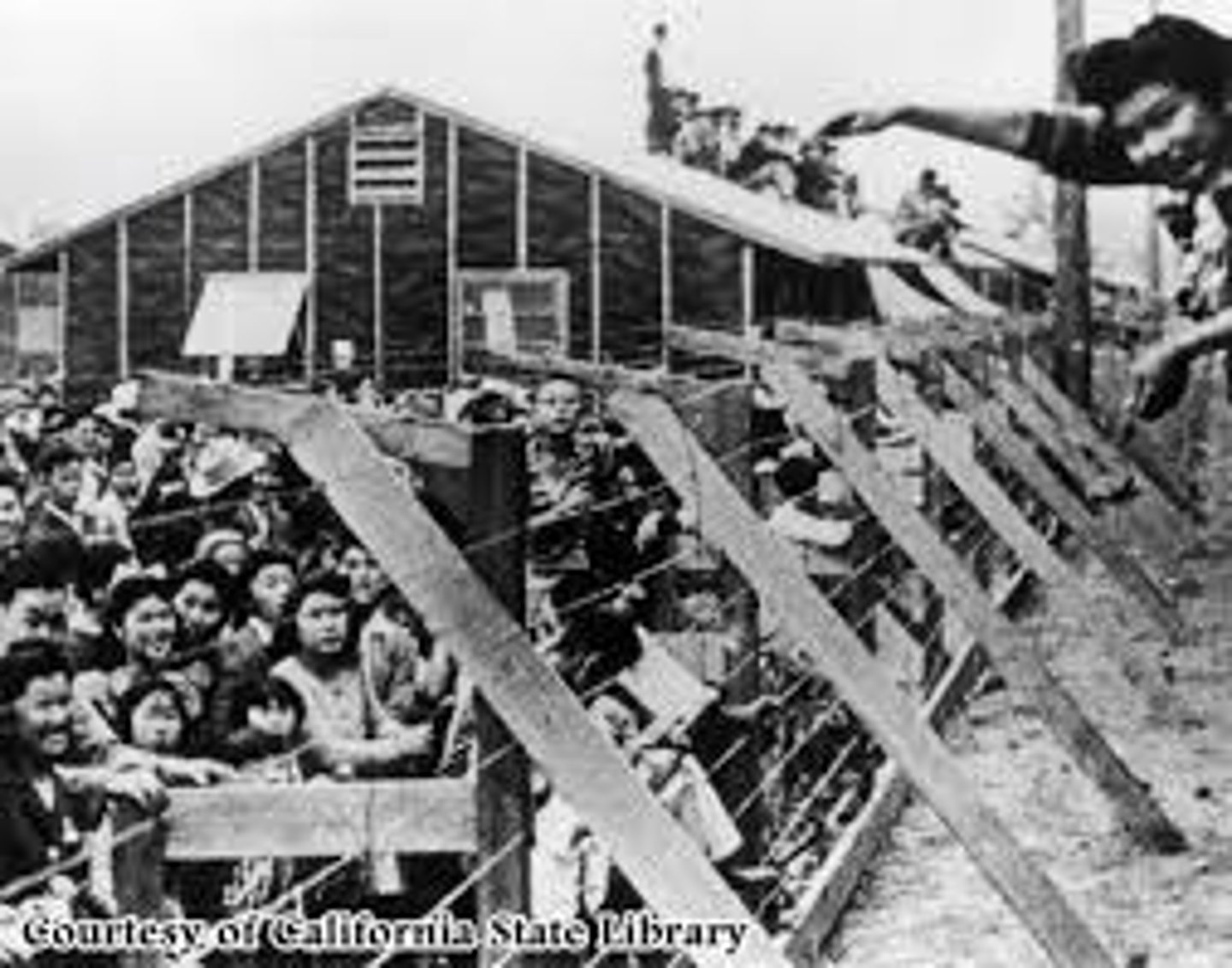 <p>A 1944 internment of Japanese Americans in encampments during World War II.</p>