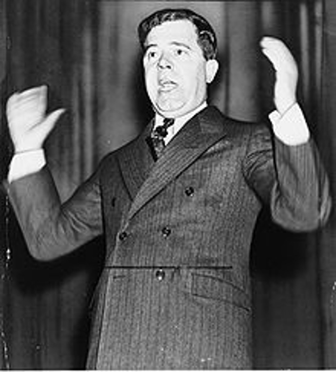 <p>As senator in 1932 of Washington preached his "Share Our Wealth" programs. It was a 100% tax on all annual incomes over $1 million and appropriation of all fortunes in excess of $5 million. With this money Long proposed to give every American family a comfortable income, etc. Known as the "King Fish."</p>