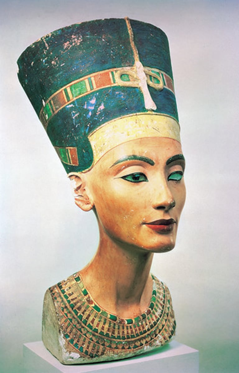 <p>a sculpture depicting a head, neck, and upper chest of a figure</p>