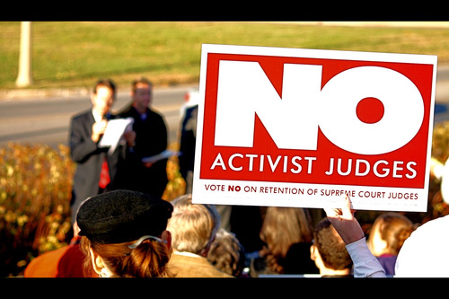 <p>to politicize</p>