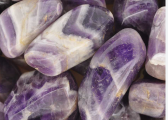 <p>quartz varieties- amethyst silicates </p>