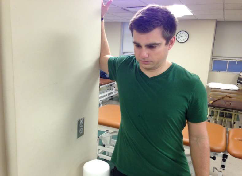 <p>door stretch with elbow bent&nbsp;</p>