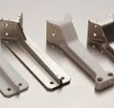 <p><span>To plate with an adherent metallic coating by electrolysis, usually to increase the hardness, improve the durability or enhance the appearance of the base metal.</span></p>