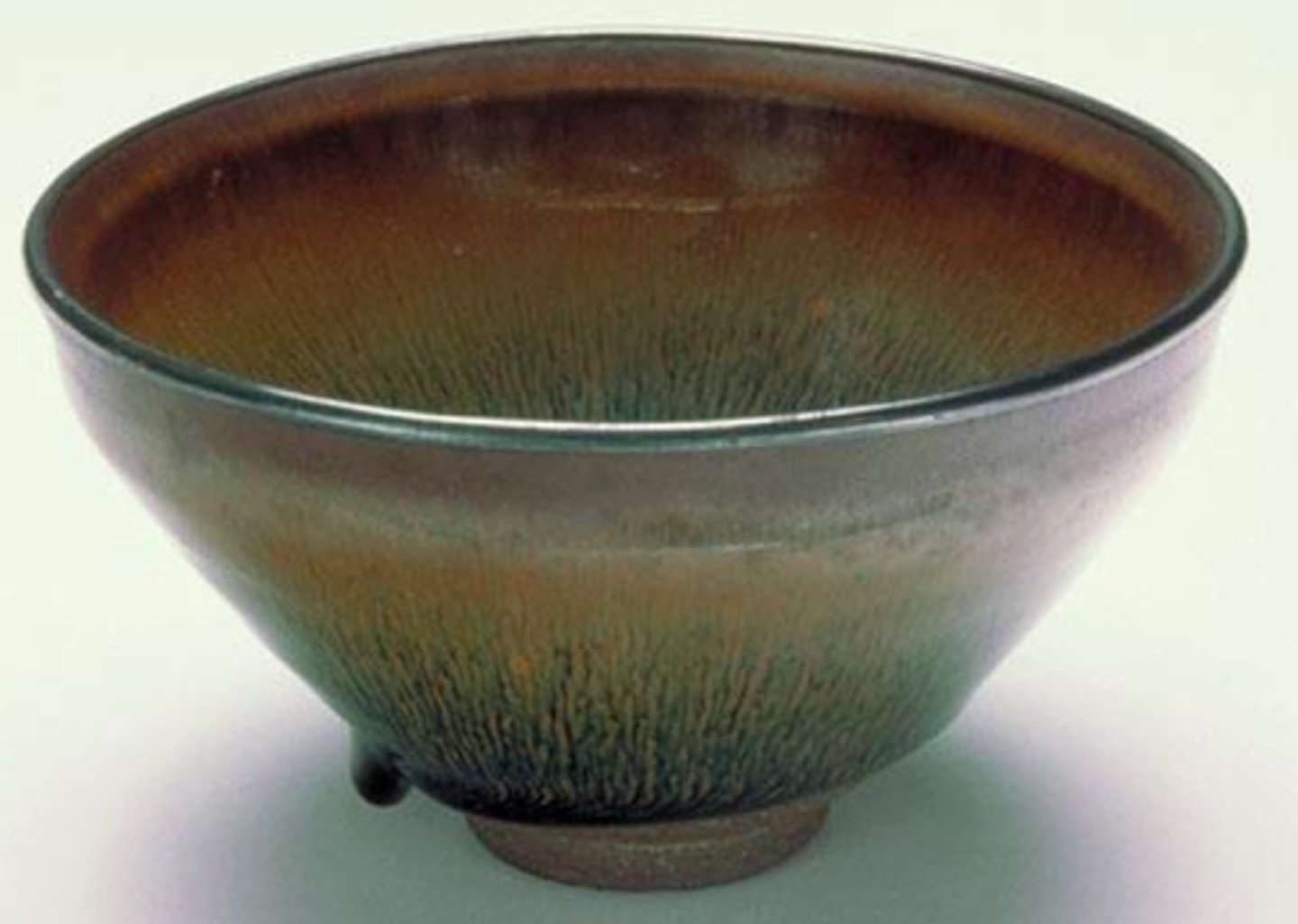 <p>Thick, <span class="bgY">purplish-brown</span> Japanese ware.</p>
