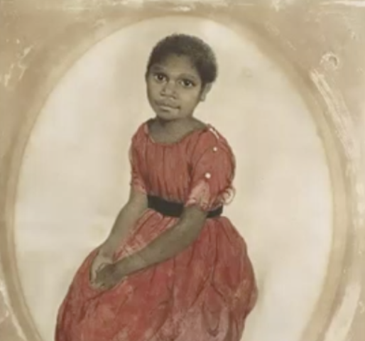 <p>What is the story of Mathinna (girl in red dress painting)</p>