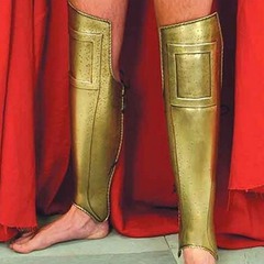 decorated leather/metal shin armor
