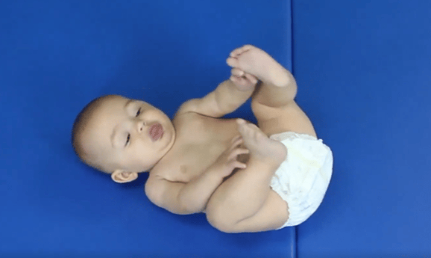<p>1. Flex neck and lift head off surface showing antigravity neck flexion</p><p>2. Bring feet to mouth</p><p>3. Rolls prone to supine</p>