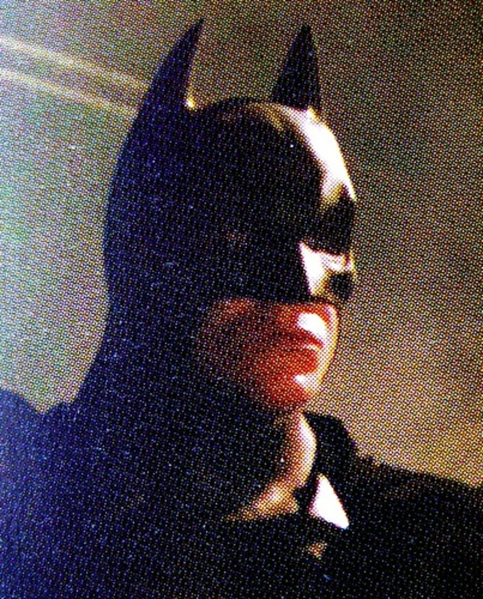 <p>metaphor - compares the darkness of night to a mask.</p>