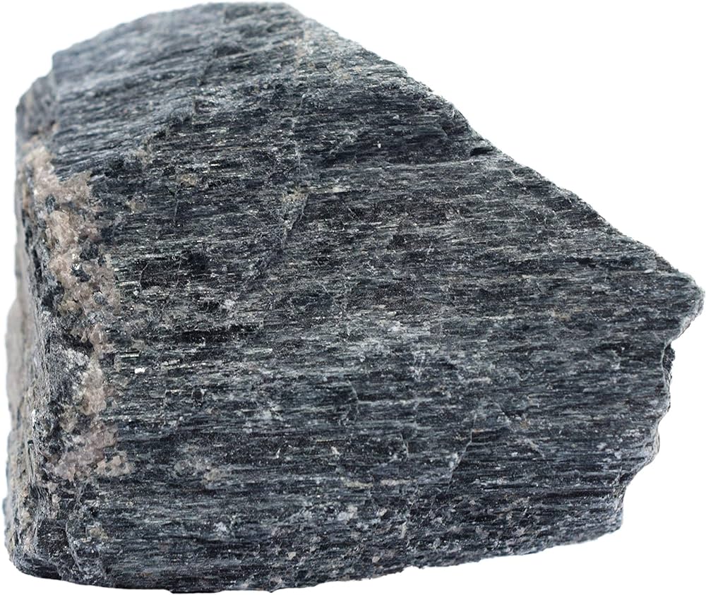 <p>Mineral: Horneblende</p><p><span style="font-family: arial">Hornblende minerals as a group are relatively easy to identify. The diagnostic properties are their dark color (usually black) and two directions of excellent cleavage that intersect at 124 and 56 degrees. The angle between the cleavage planes and hornblende's elongate habit can be used to distinguish it from augite and other pyroxene minerals that have a short blocky habit and cleavage angles intersecting at about 90 degrees. The presence of cleavage can be used to distinguish it from black tourmaline that often occurs in the same rock</span></p>