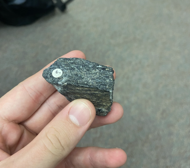 <p>Smoother, lateral lines of formation, <strong>Road asphalt/ building stone</strong></p>