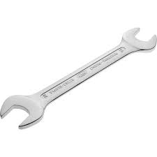 could be in the shape of a screw driver or a wrench. Its function is to drive screw with hexagonal slot head.