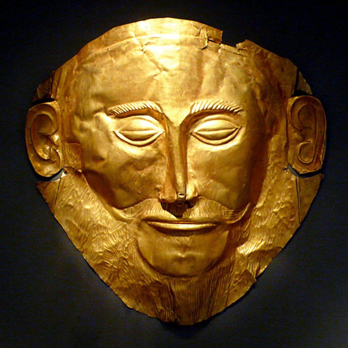 <p>MYCENAE.</p><p>- Mycenian</p><p>- from Royal Tombs</p><p>- Funerary Mask</p><p>- First to ever depict mustache</p><p>-Most likely faked by Schliemann </p>