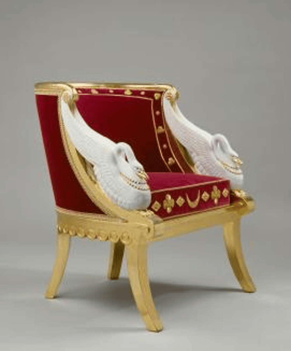 <p>French Empire</p><p>Chair with a deep concave back, curved stiles that sweep toward the seat rail</p>