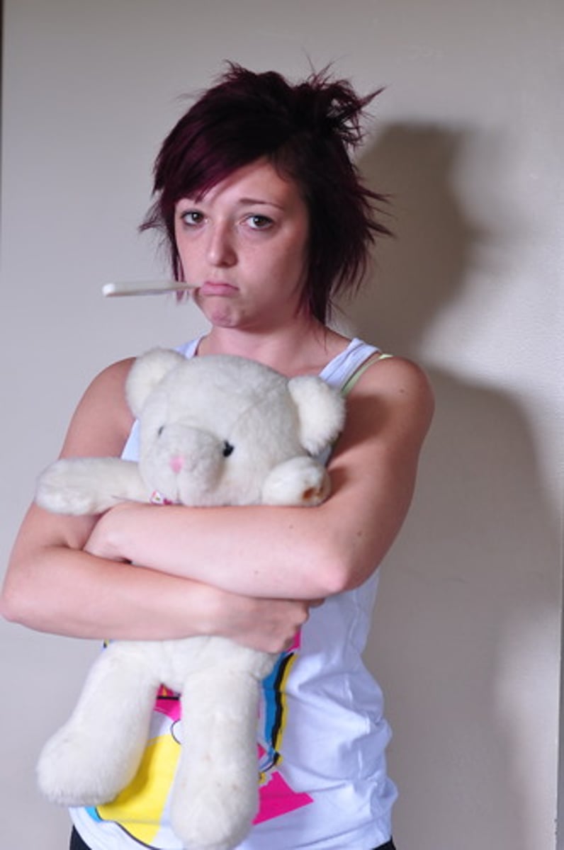 <p>slightly ill:</p><p><em>I'm feeling a bit o___-c____ today.</em></p>