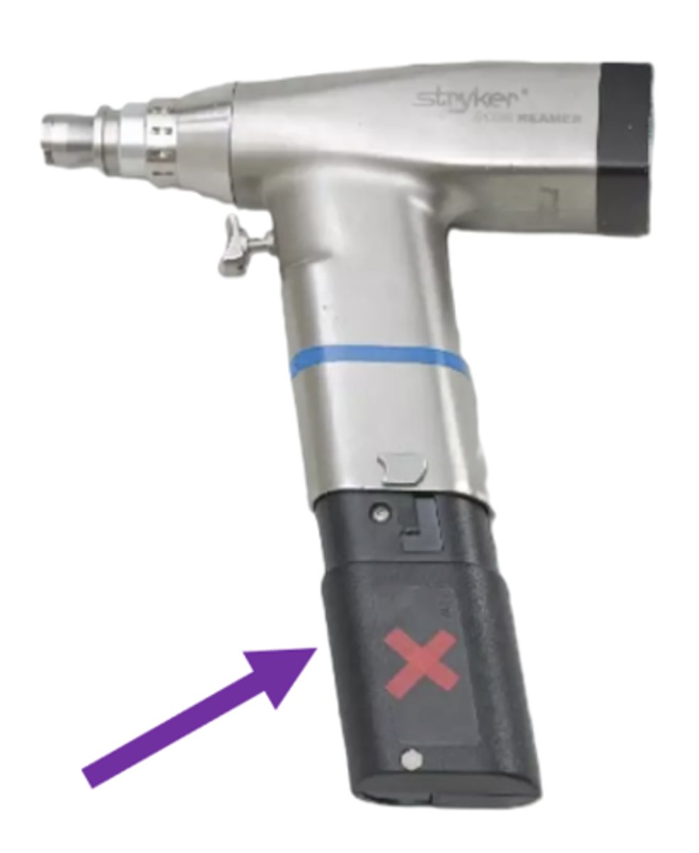 <p>a battery attached to a battery-powered instrument during decontamination to protect its electrical components from moisture (often marked with a red "X" for easy identification)</p>