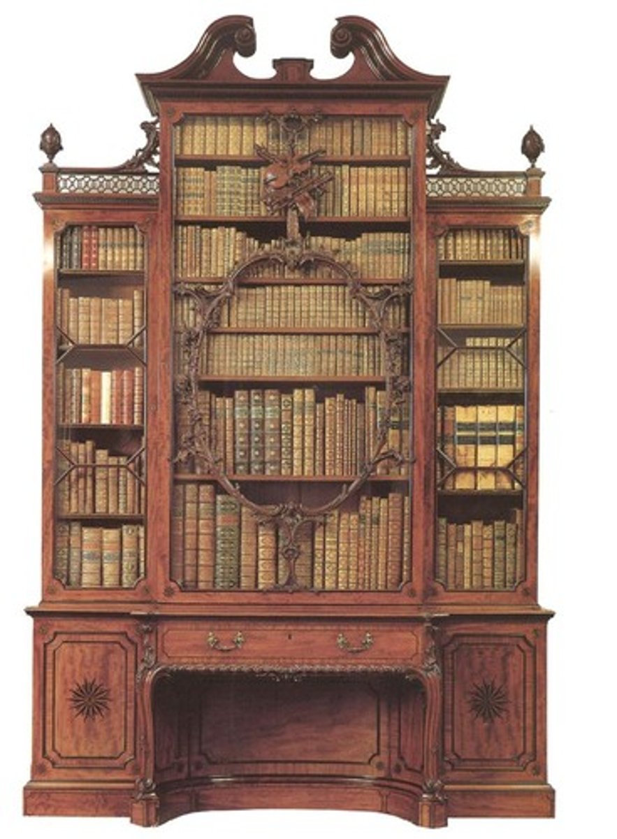 <p>Large cabinet where the center section projects beyond the two side sections</p>