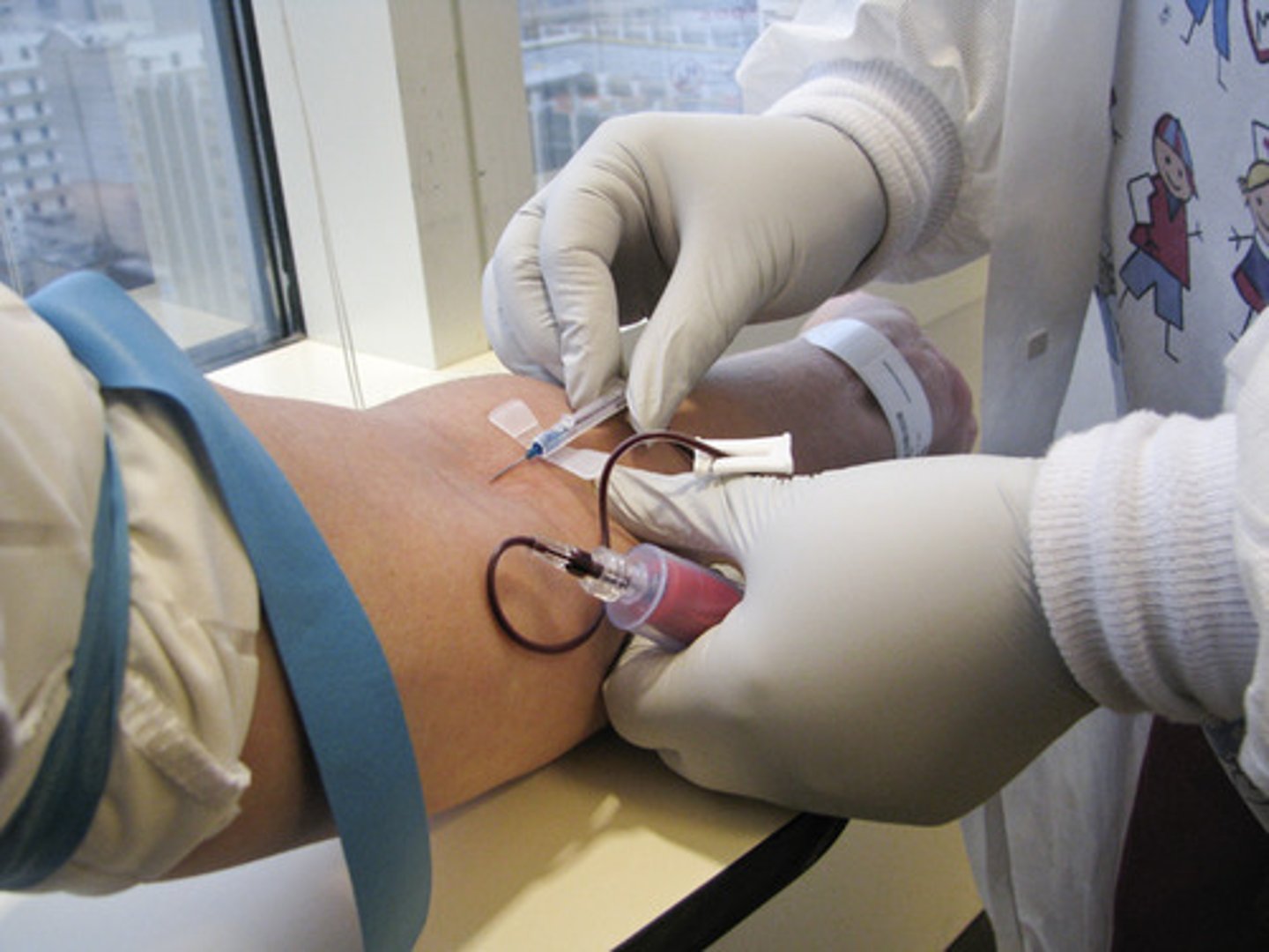 <p>specialist in drawing blood</p>