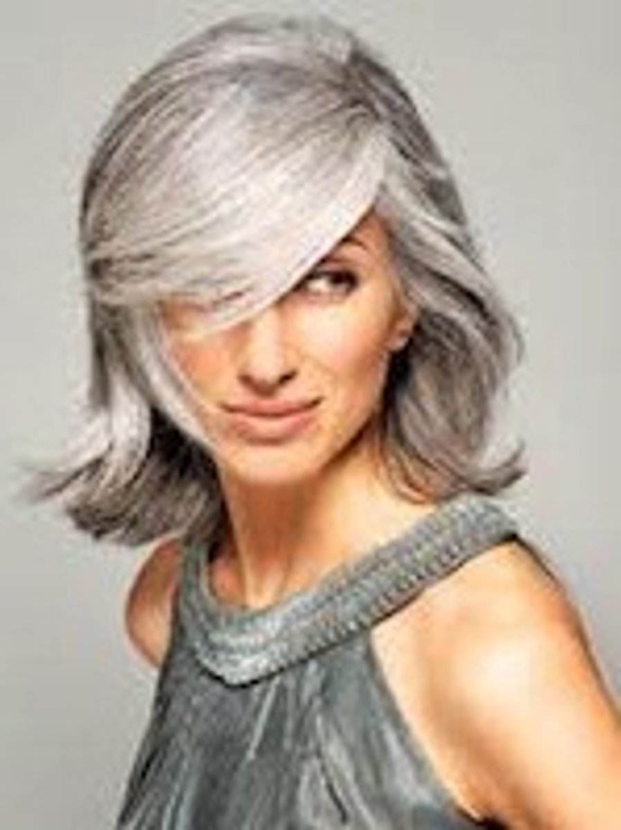 <p>grey-haired / grey headed</p>