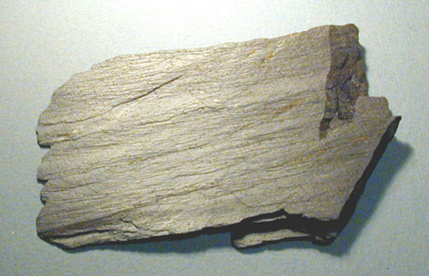 <p>Metamorphic</p><p>Parent description: Slate</p><p>Metamorphism: N/A</p><p>Grain: Very fine grains, wavy bands</p>