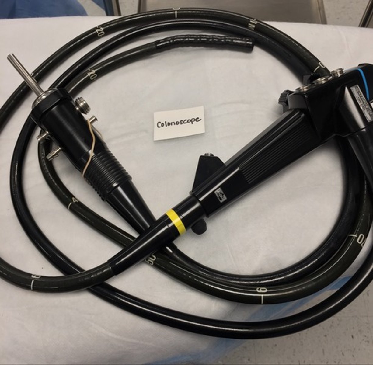 <p>examines the lower GI tract</p>