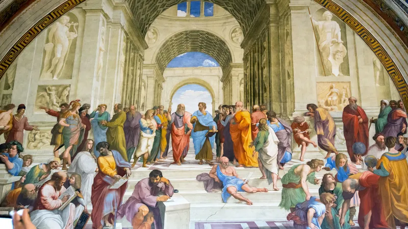 <p>Plato points upwards: symbolizes his “ideal” philosophy, he did not believe Forms resided in the earthly realm but beyond it</p><p>Aristotle points down: symbolizes his “practical” philosophy, rejected Forms</p>