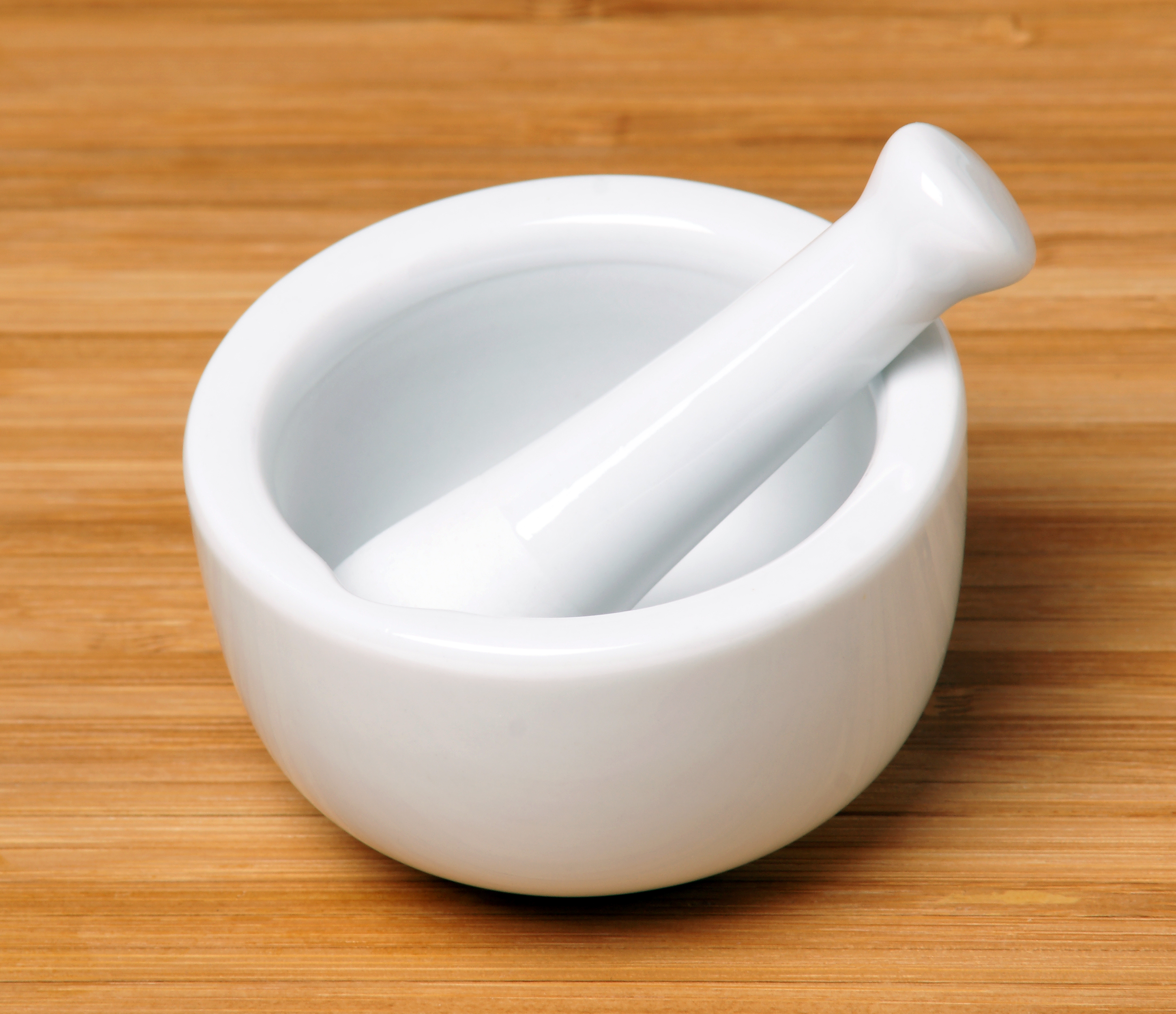 <p>mortar and pestle</p>