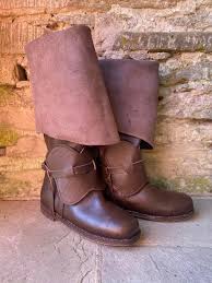 <p>boots which can be pulled up while riding to protect hose</p>
