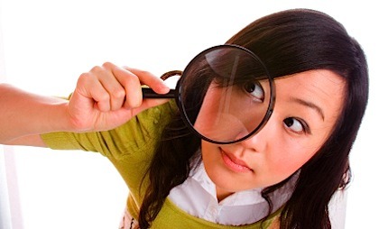 the act of examining something closely (as for mistakes)