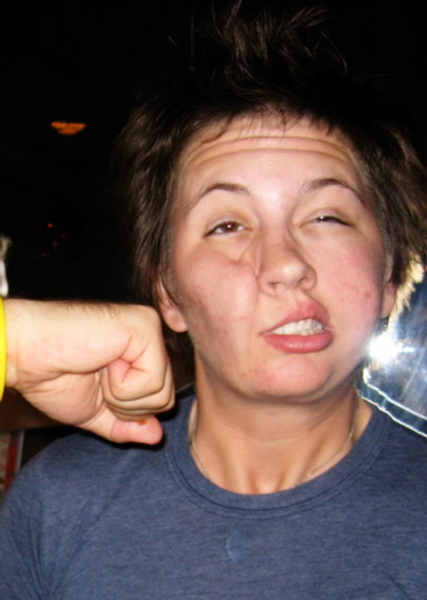<p>(v.) to make a quick hit with a closed hand</p>
