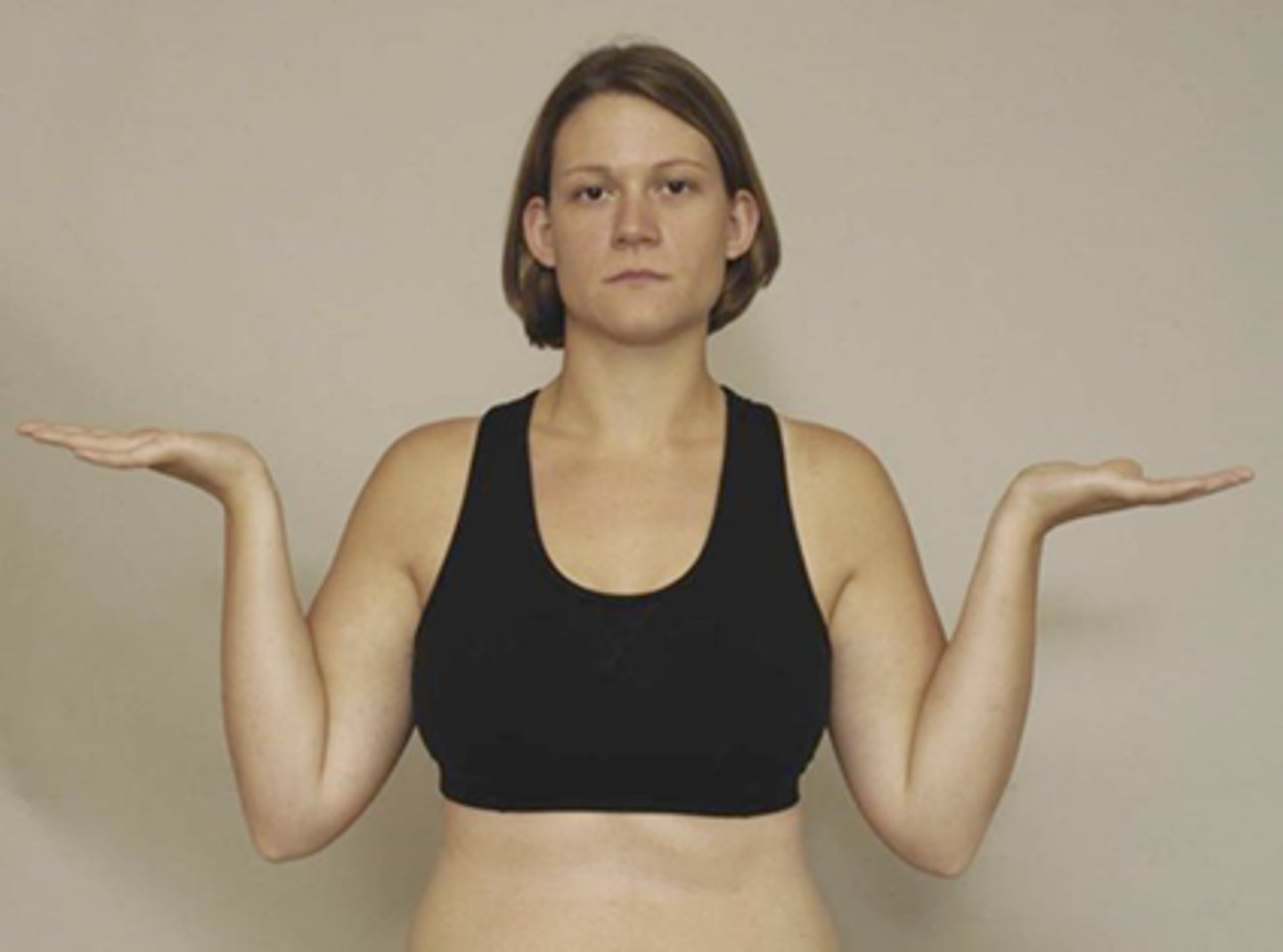 <p>elbow fully flexed with wrist extended and shoulder abducted to 90</p>