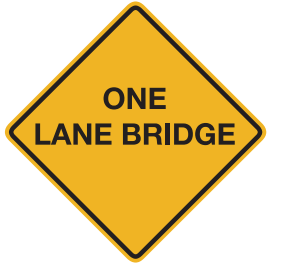 The bridge is wide enough for only one vehicle at a time. Make sure the bridge is clear of oncoming traffic before you cross. 