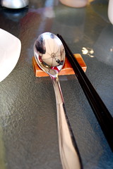 <p>a spoon and chopsticks</p>