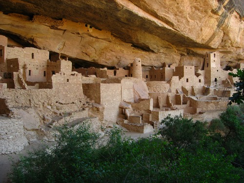 <p>The Mesa Verde Cliff Dwellings, located in Montezuma County, Colorado, are an exceptional representation of Ancestral Puebloan architecture and culture. Constructed primarily from sandstone, these dwellings are famous for their remarkable location within the cliff faces of the Mesa Verde plateau. Dating from approximately 600 to 1300 CE, the dwellings include multi-story structures, such as the significant Cliff Palace, which is one of the largest cliff dwellings in North America. The architectural techniques employed by the Anasazi, such as the use of mortar from sandstone to bond the stones and the incorporation of kivas (ceremonial structures) into their designs, highlight their advanced engineering skills. Each dwelling was intricately designed to provide shelter, community space, and maintain a connection to the surrounding natural environment. The cliff dwellings also served as defensive structures against potential invasions, showcasing the Anasazi's adaptability to their harsh environment. Today, Mesa Verde National Park is recognized as a UNESCO World Heritage Site, preserving these remarkable structures as a testament to the ingenuity and resilience of the Ancestral Puebloans.</p>