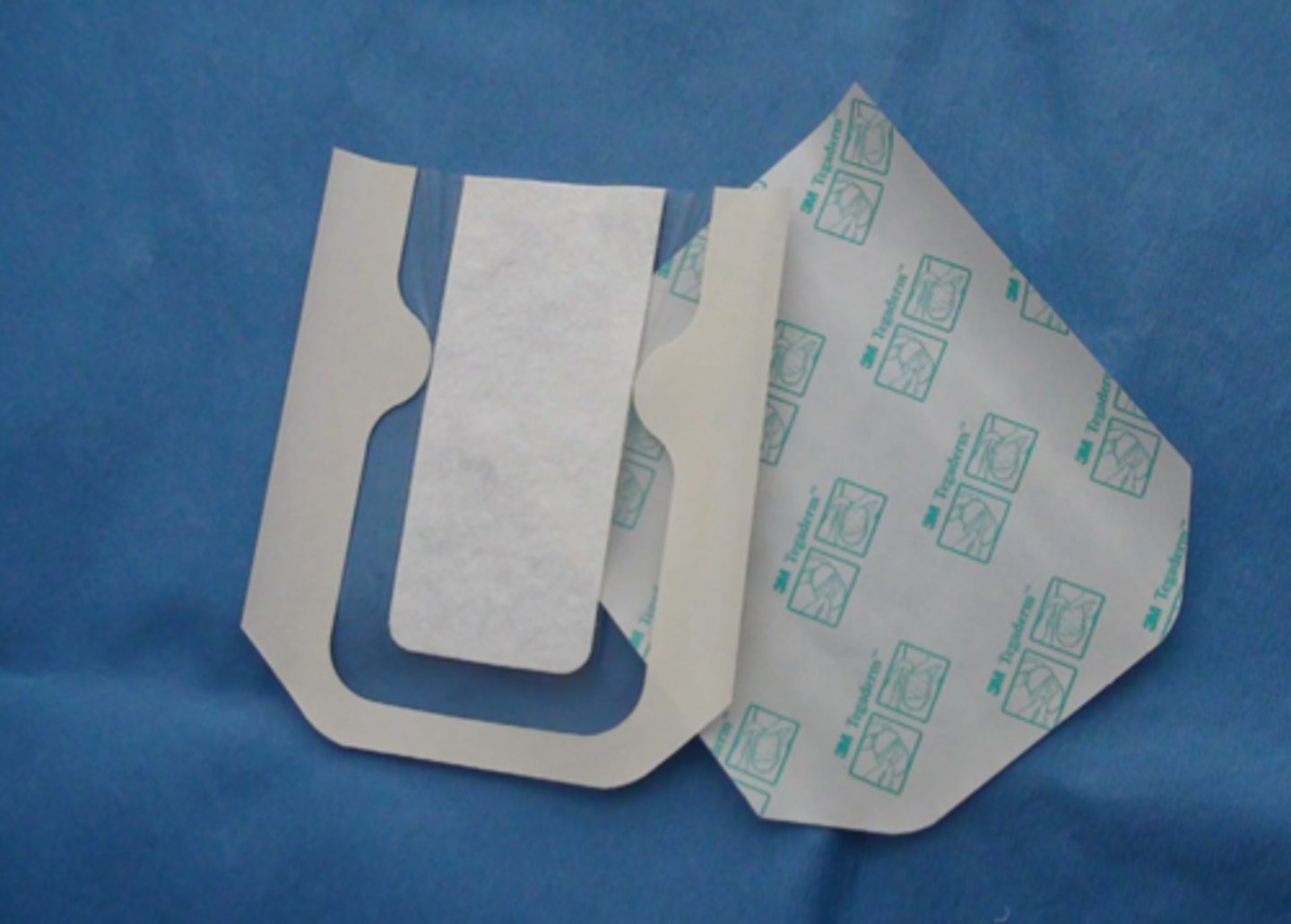 <p>Tegaderm film is a transparent, occlusive (made from impermeable plastic) wound cover which can be used to cover and protect dressings for wounds or cover catheter sites. It is not breathable but conforms to skin.</p>