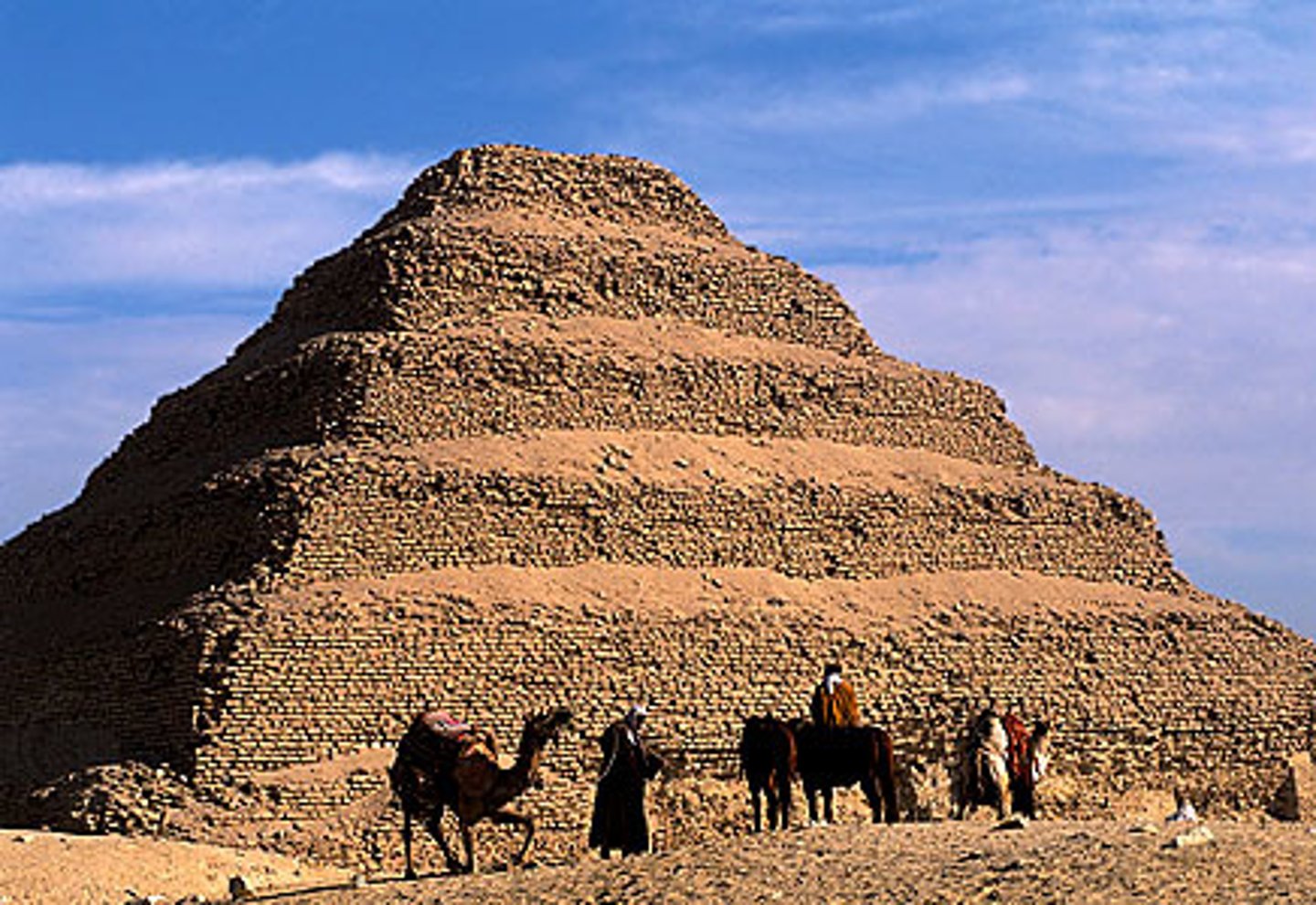 <p>Composed of series of stacked mastabas; each smaller, and stacked on top of each other</p>