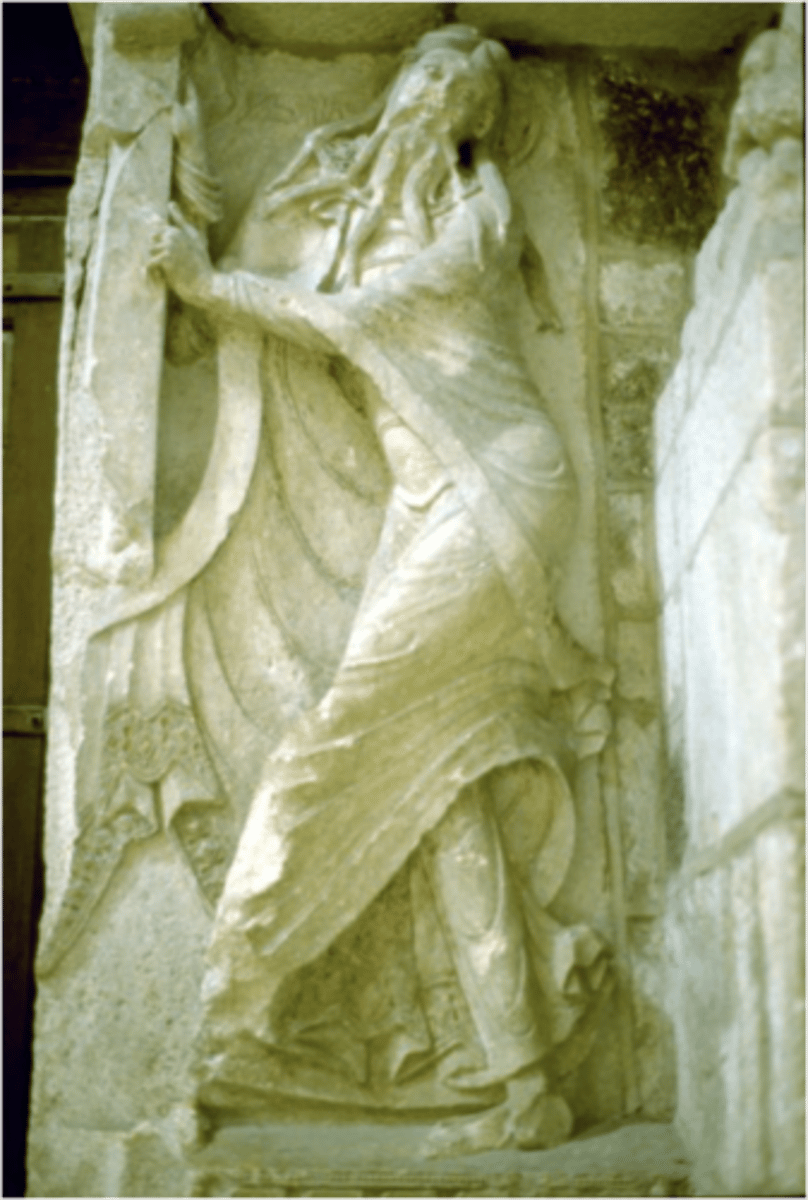 <p>Prophet Isaiah, depicted in a twisting, dynamic pose, holding a scroll</p><p>emphasizing Isaiah’s role as a visionary prophet foretelling Christ’s coming.</p>